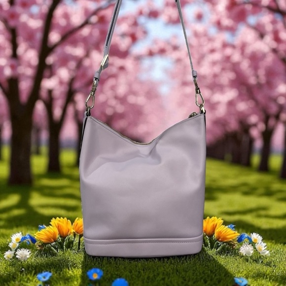 Kate Spade New York
CHELSEA DUFFLE CROSSBODY Color: Violet Spritz - Picture 6 of 9